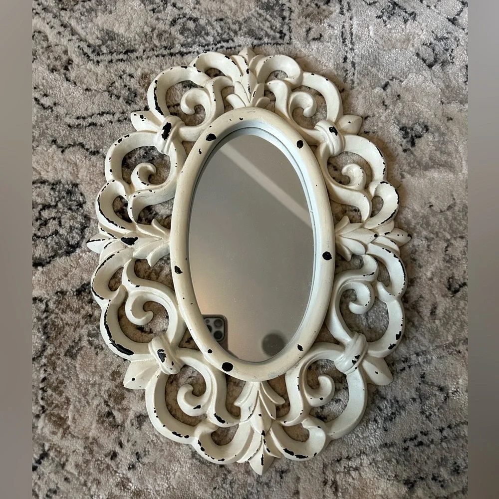Small white detailed mirror